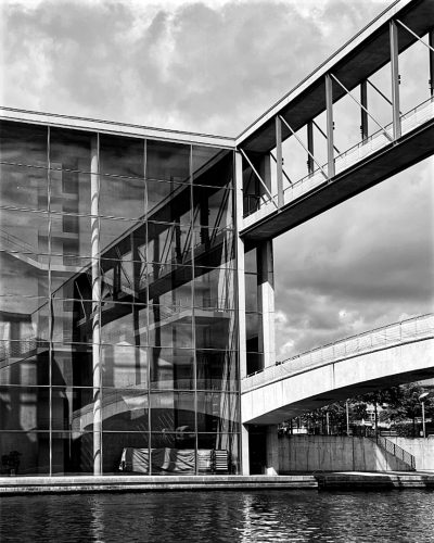 Concrete, glass and reflections.